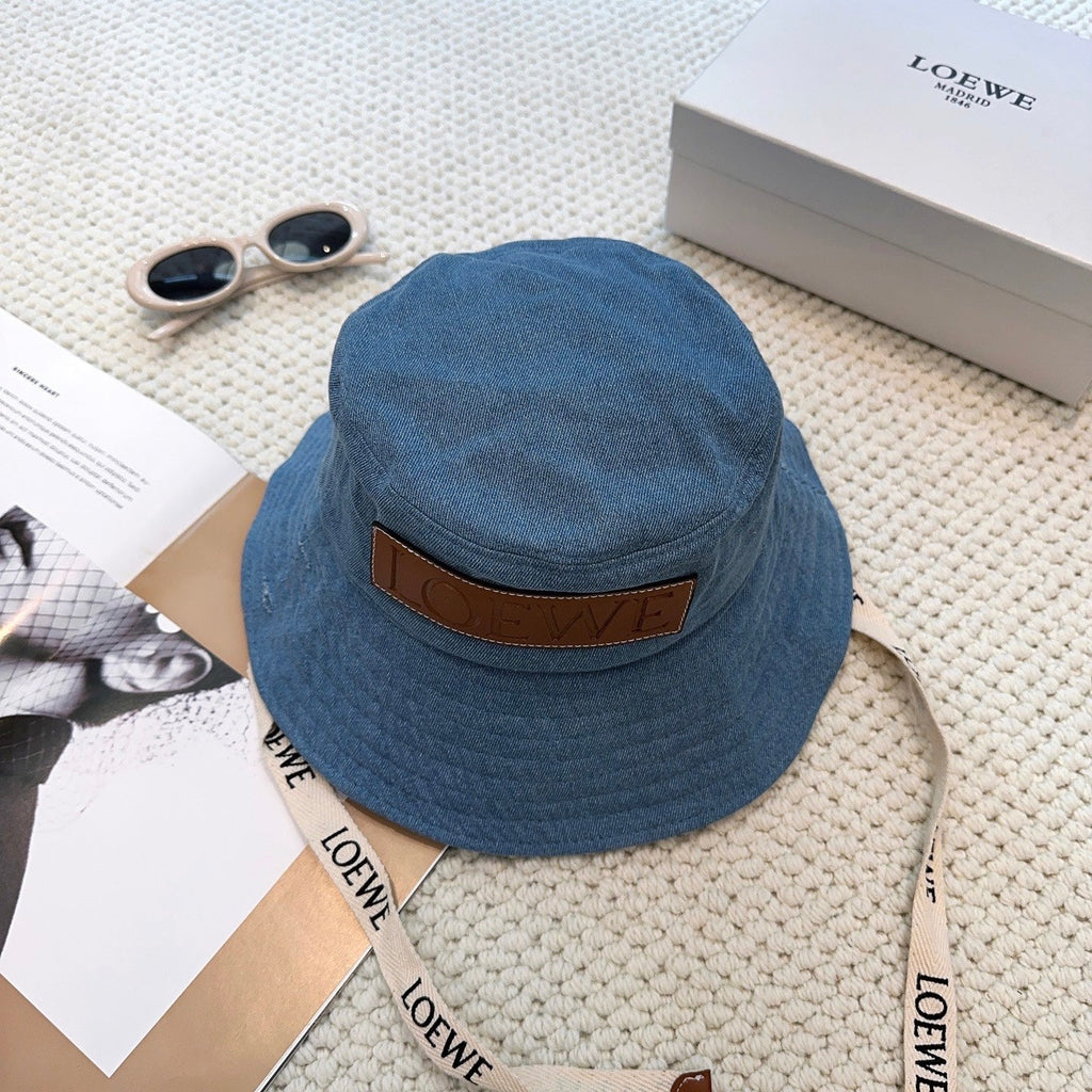 Denim bucket hat with embossed patch and detachable strap