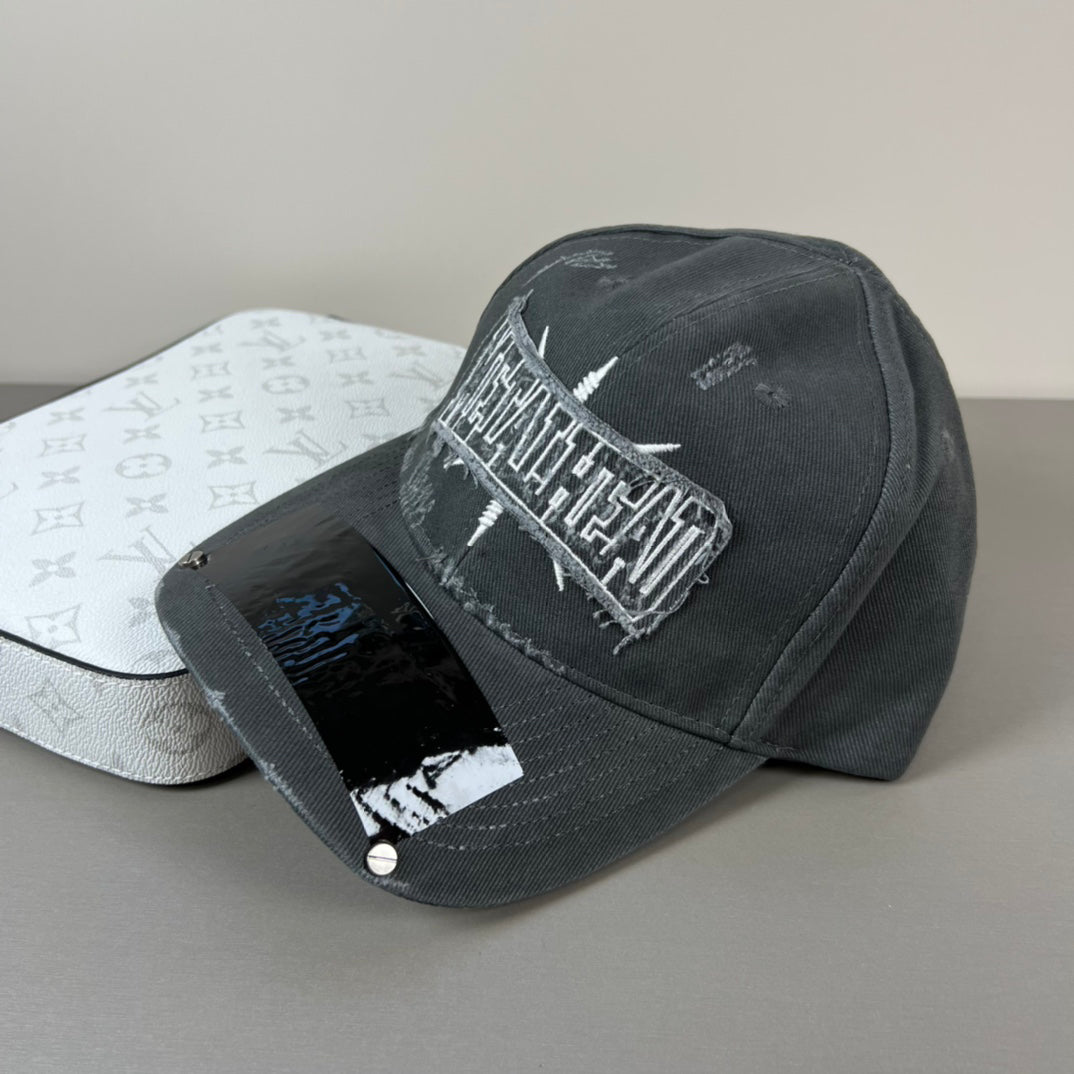 Washed black metal patch cap with glossy shield brim