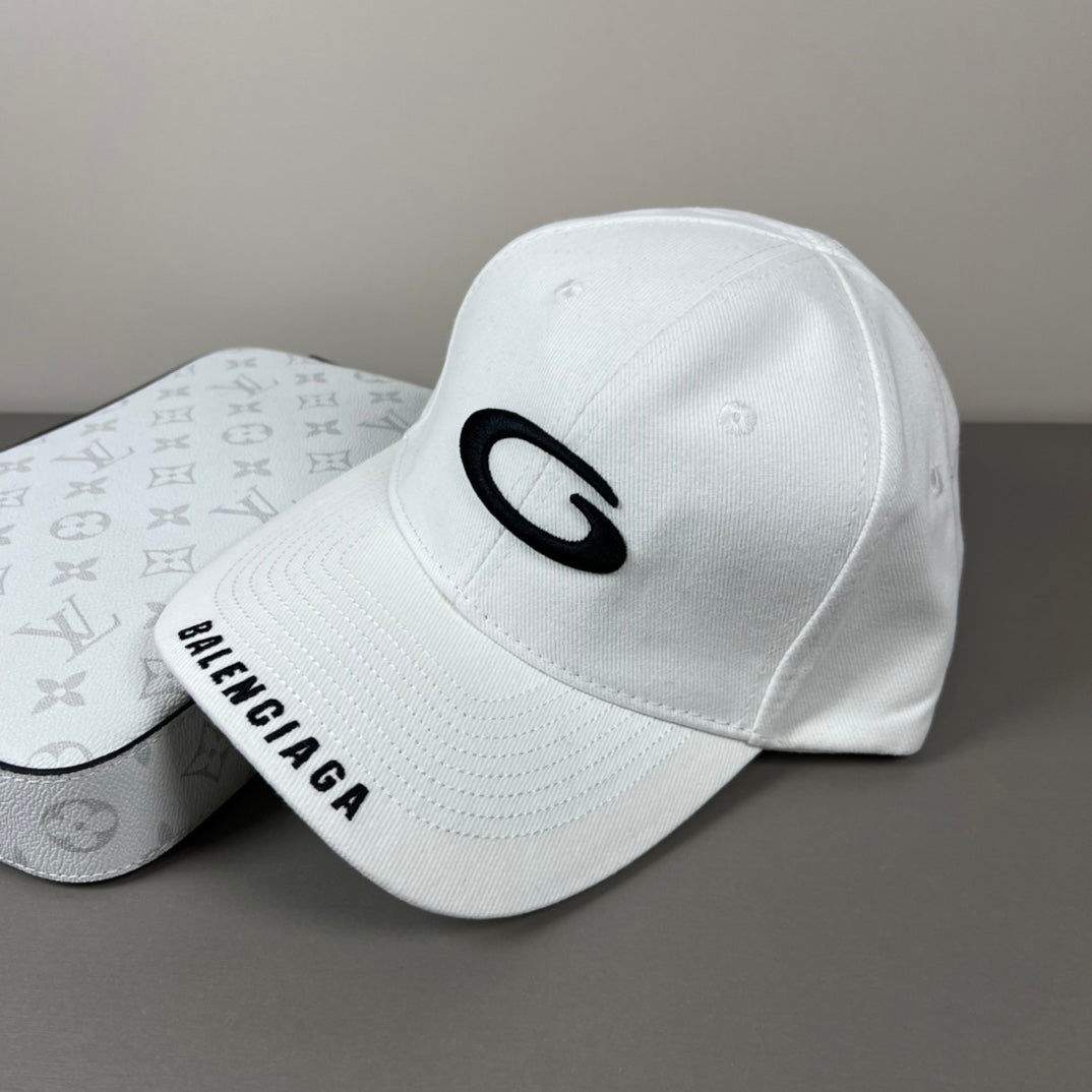 White cotton cap with graphic emblem and contrast brim embroidery