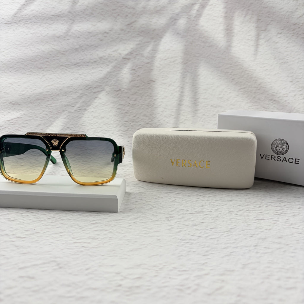 Geometric Gradient Sunglasses with Gold Accents for UV Protection