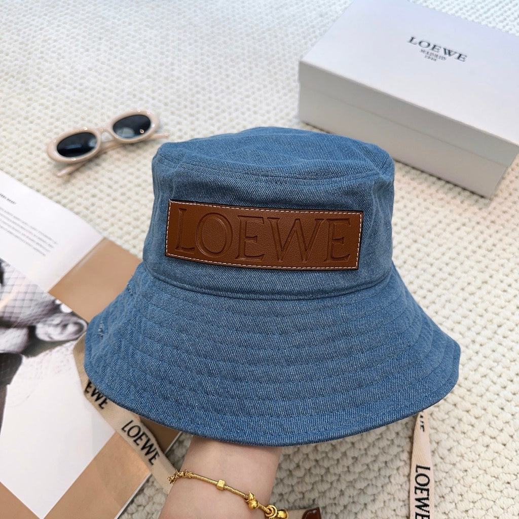 Denim bucket hat with embossed patch and detachable strap