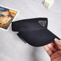 Black nylon logo‑plaque visor with curved brim