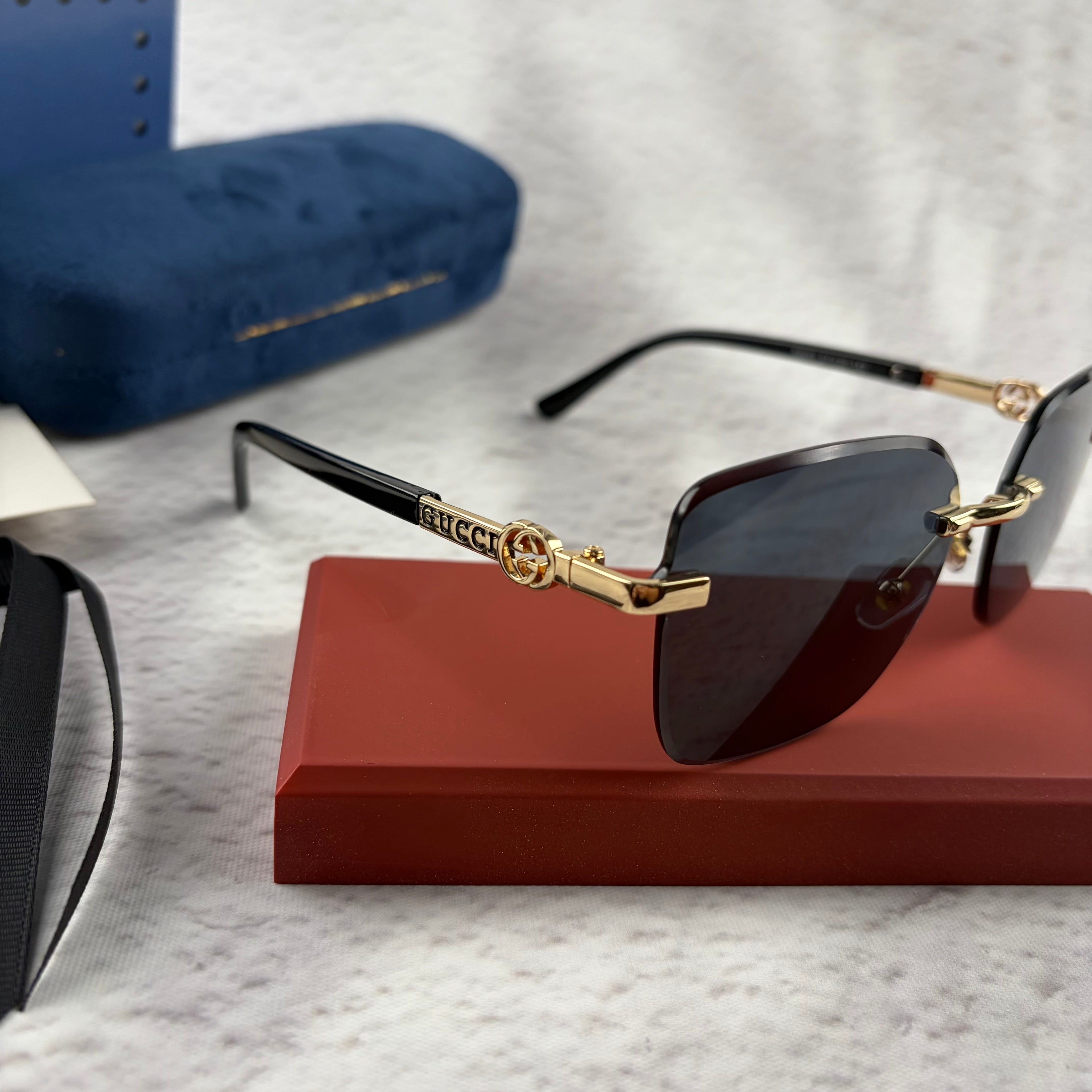 Rimless Rectangular Sunglasses with Gold-Tone Accents & UV Protection