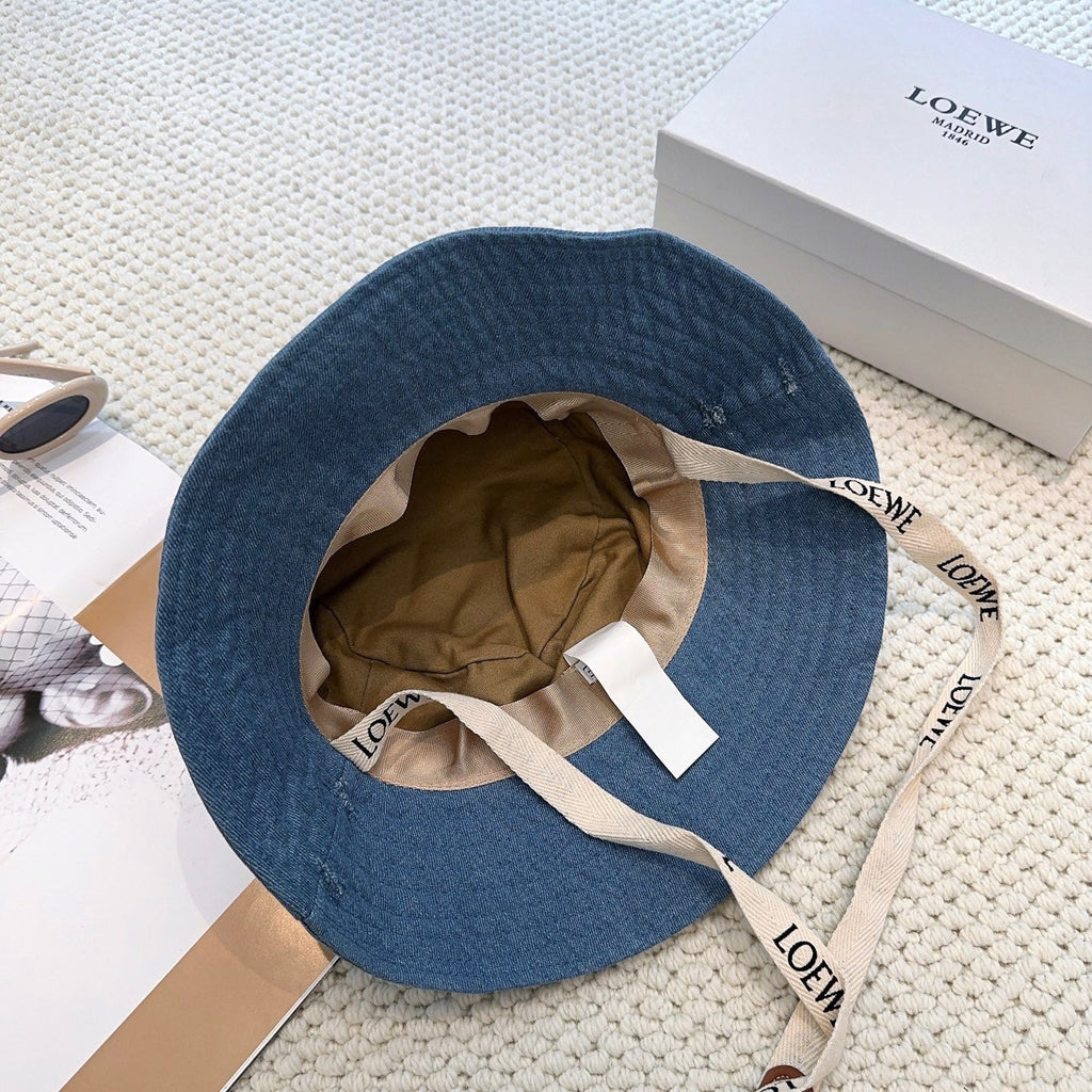 Denim bucket hat with embossed patch and detachable strap