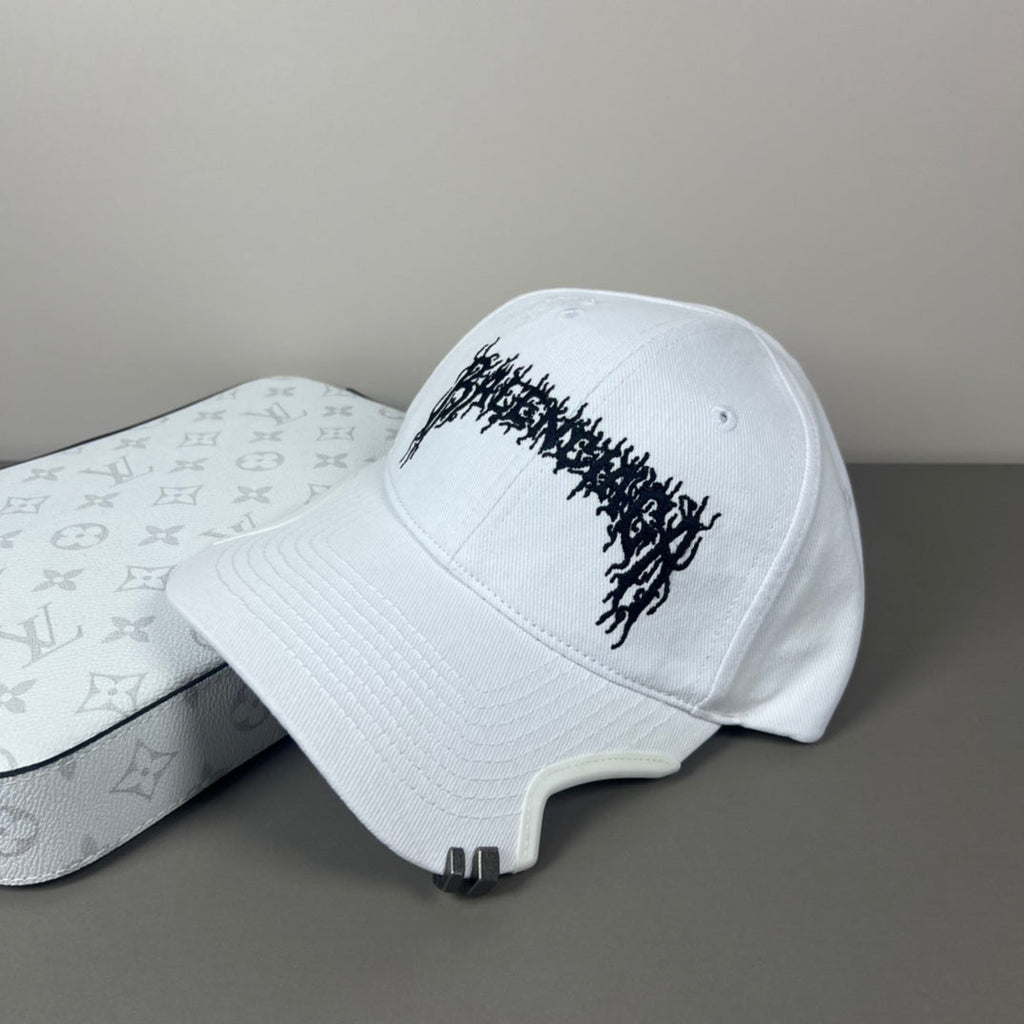 White cotton cap with black graphic embroidery and sculpted brim