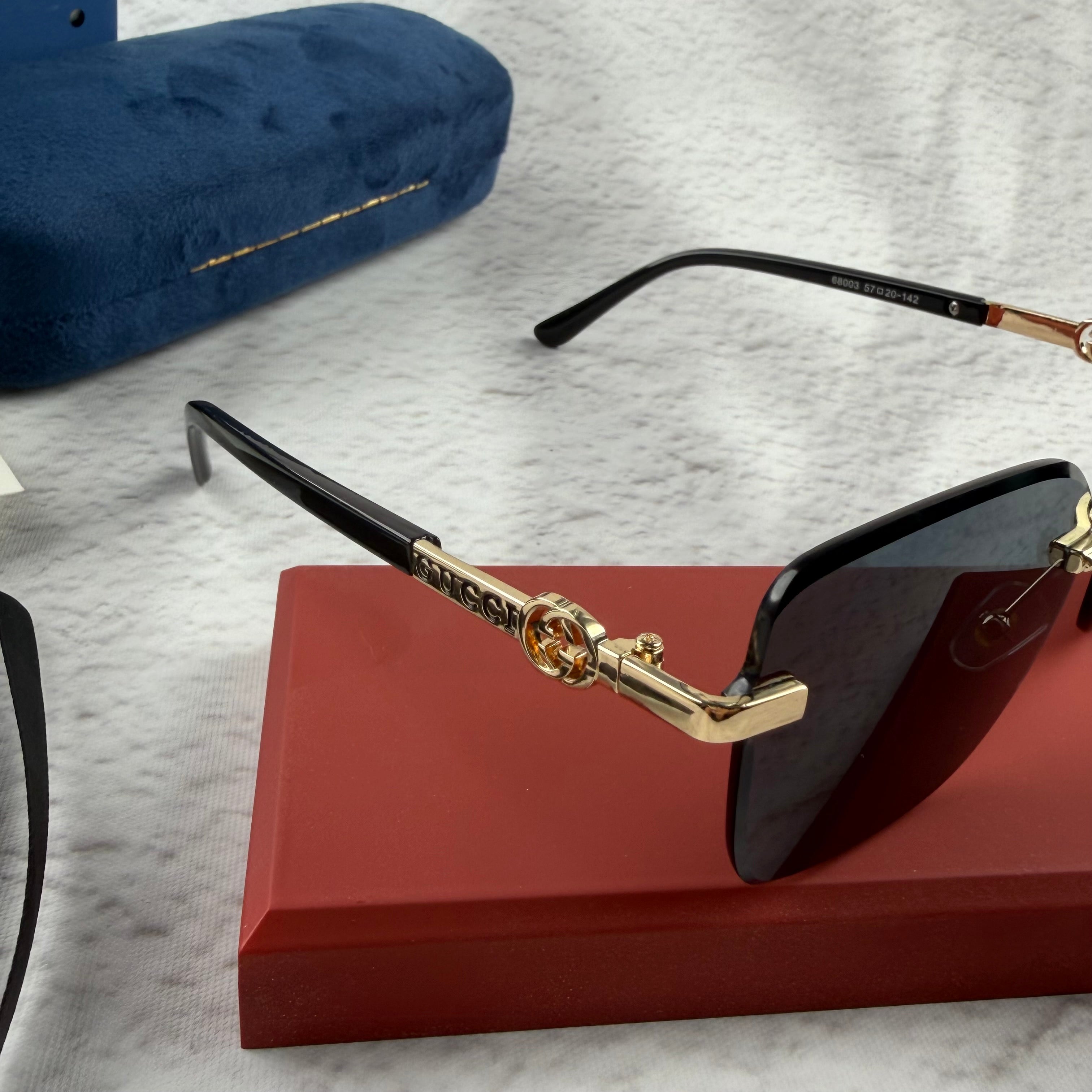 Rimless Rectangular Sunglasses with Gold-Tone Accents & UV Protection