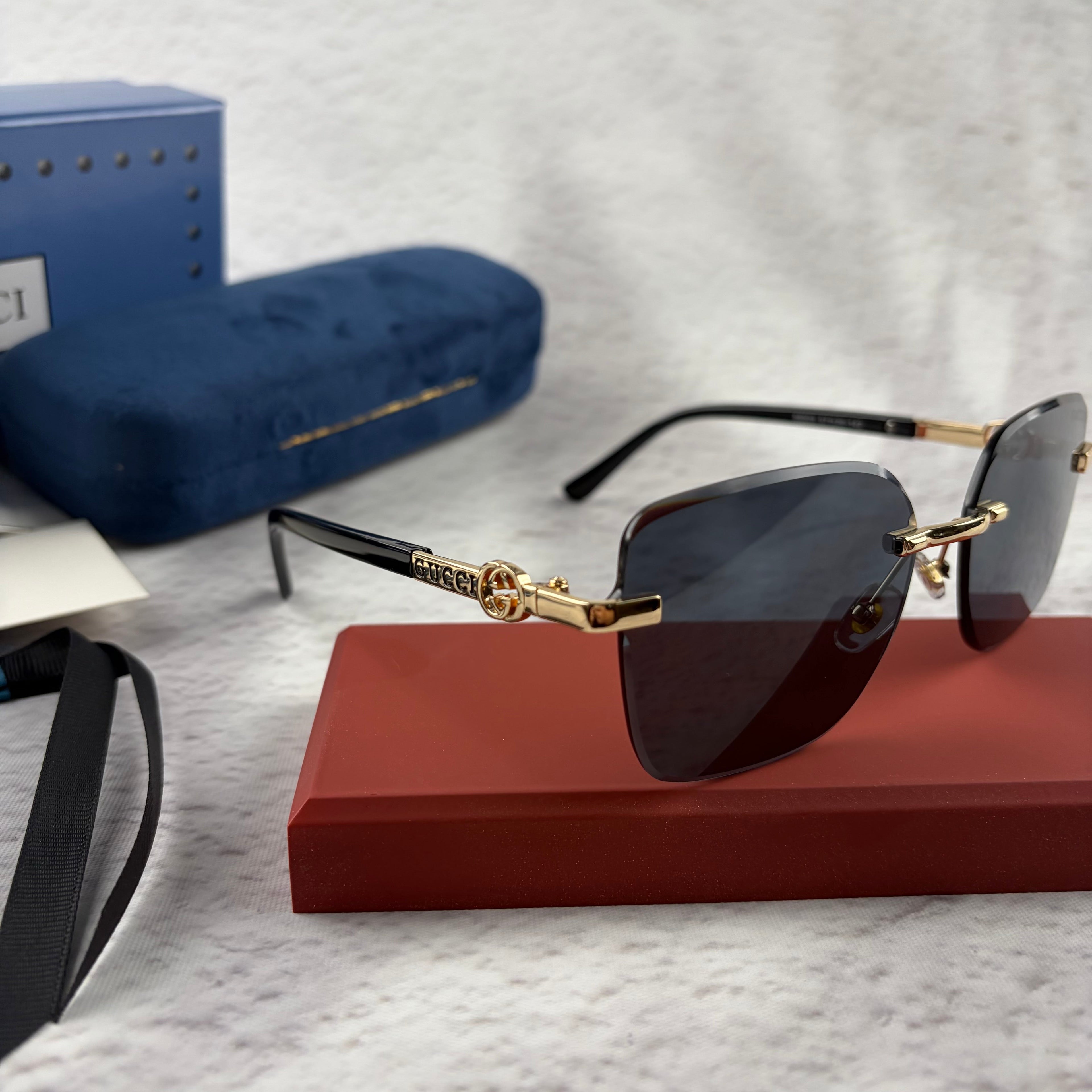 Rimless Rectangular Sunglasses with Gold-Tone Accents & UV Protection