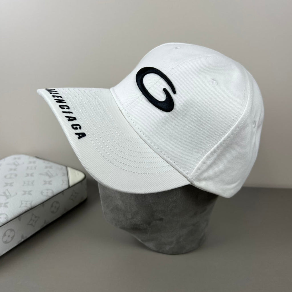 White cotton cap with graphic emblem and contrast brim embroidery