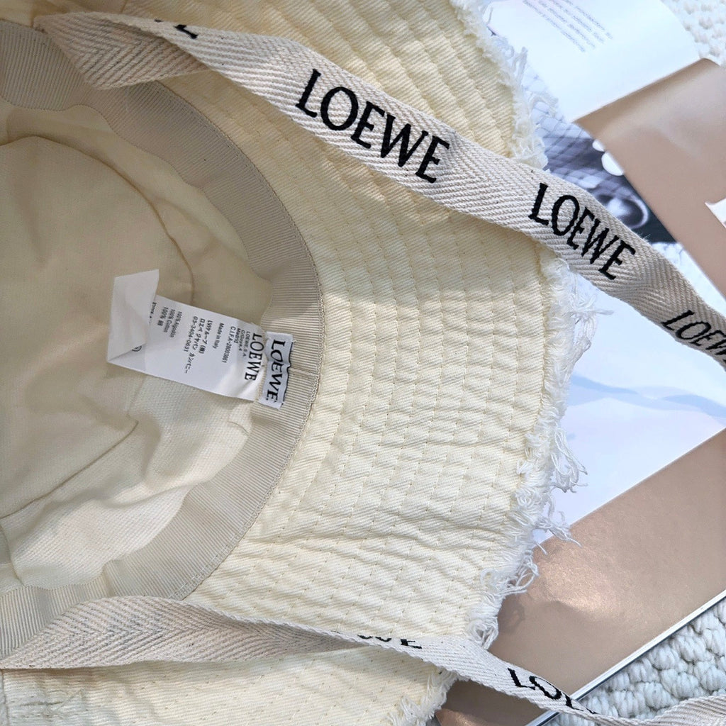 Ivory Quilted Bucket Hat with Frayed Brim and Woven Chin Strap