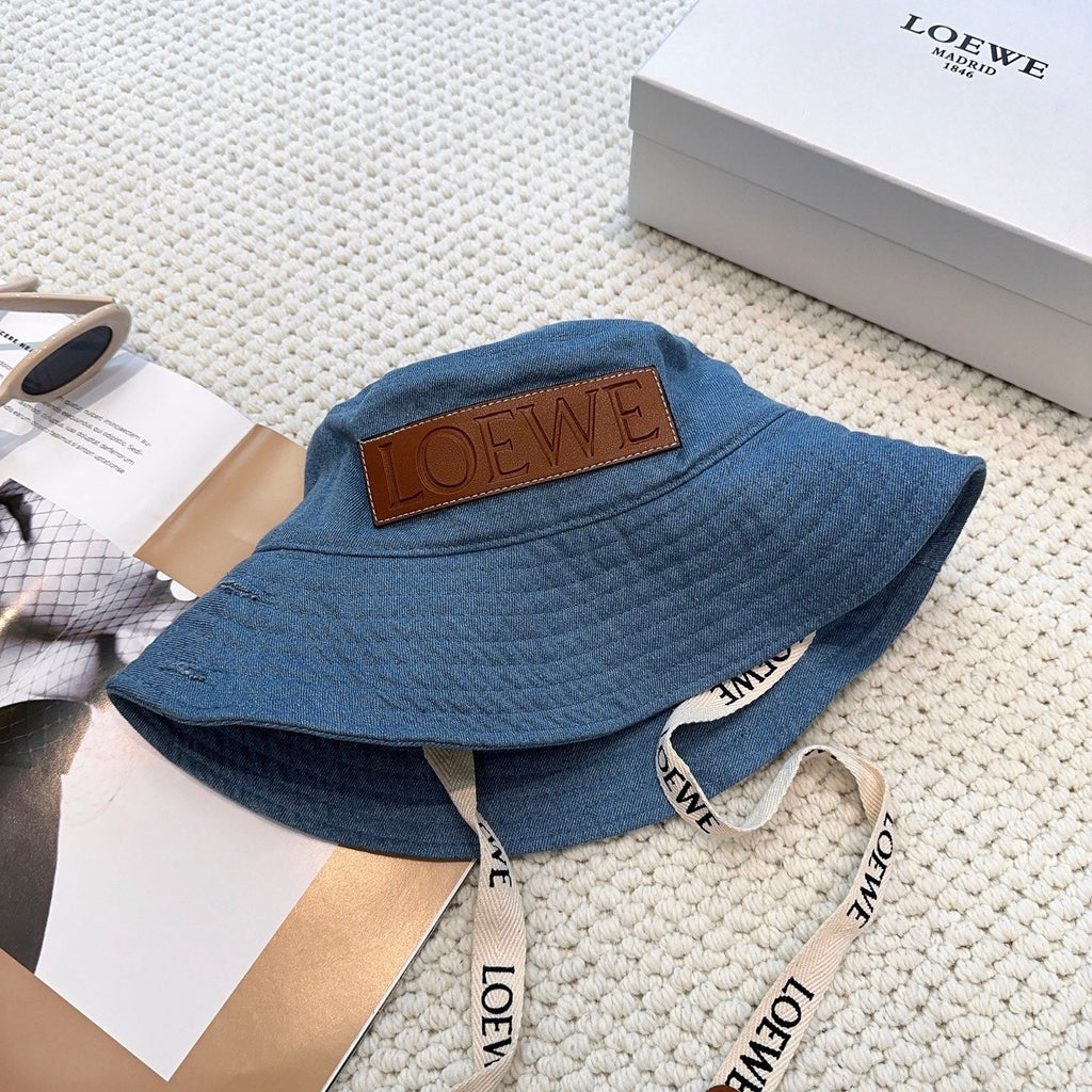 Denim bucket hat with embossed patch and detachable strap