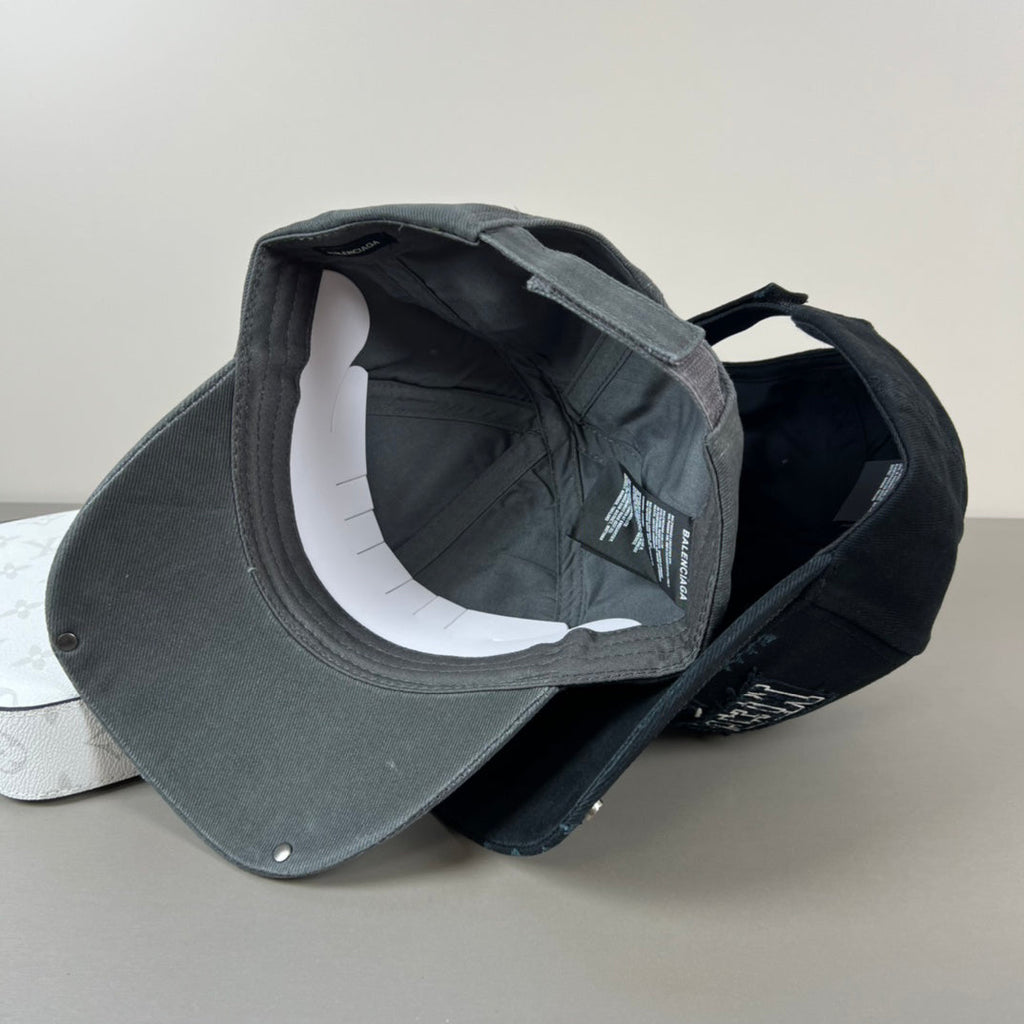 Washed black metal patch cap with glossy shield brim