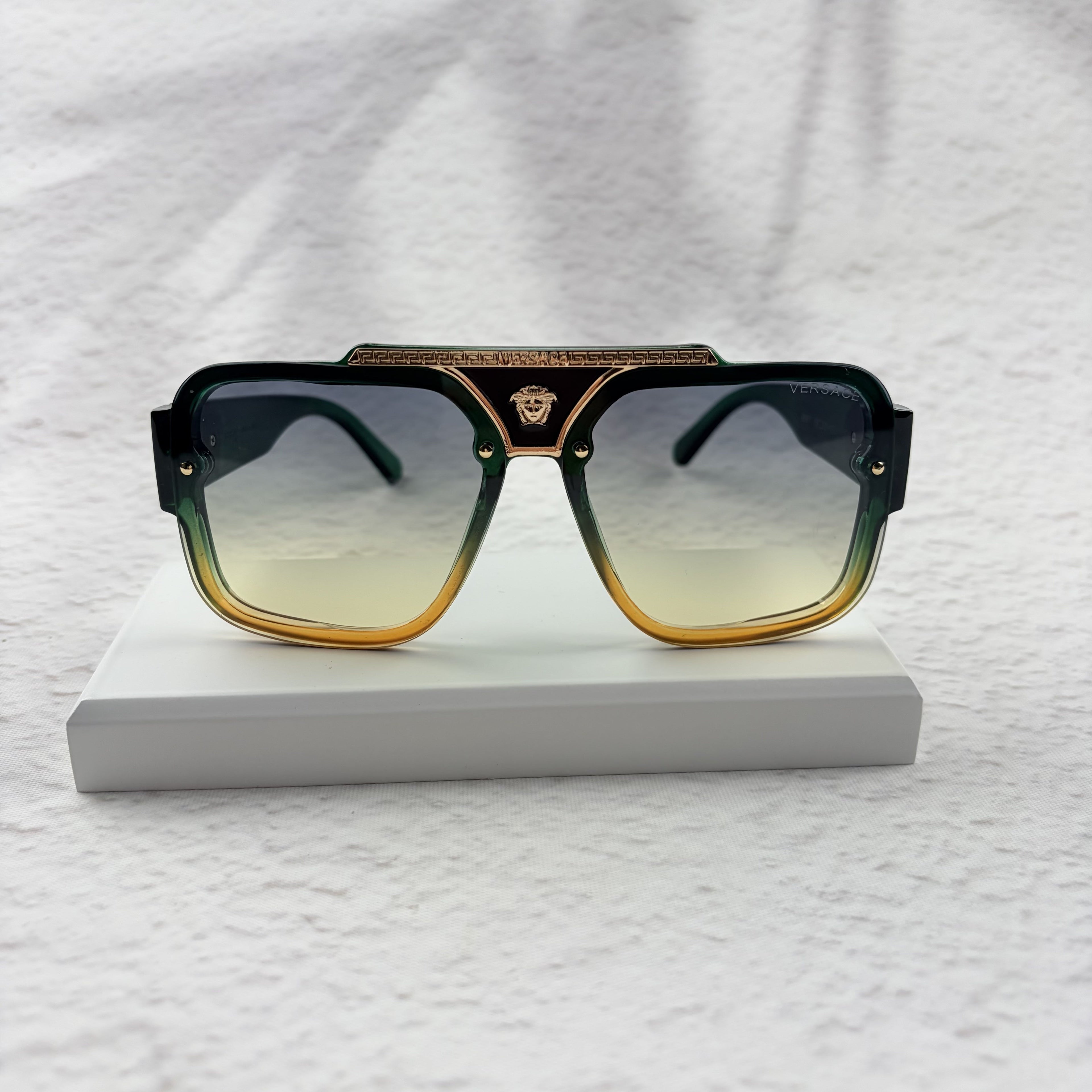 Geometric Gradient Sunglasses with Gold Accents for UV Protection