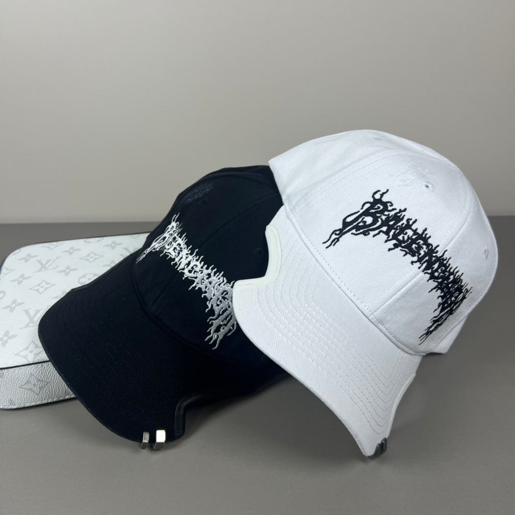 Black cotton cap with flame embroidery and notched brim
