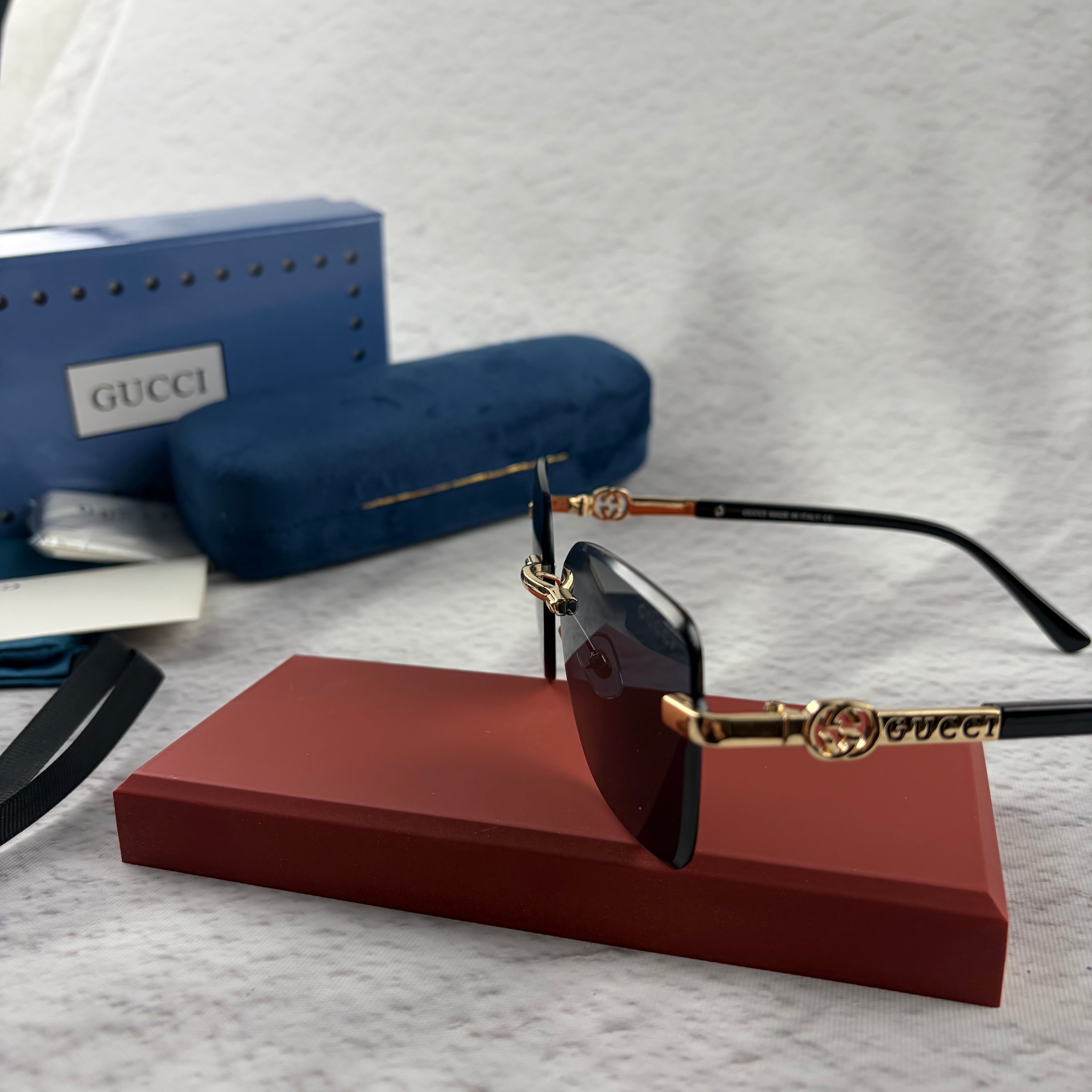 Rimless Rectangular Sunglasses with Gold-Tone Accents & UV Protection