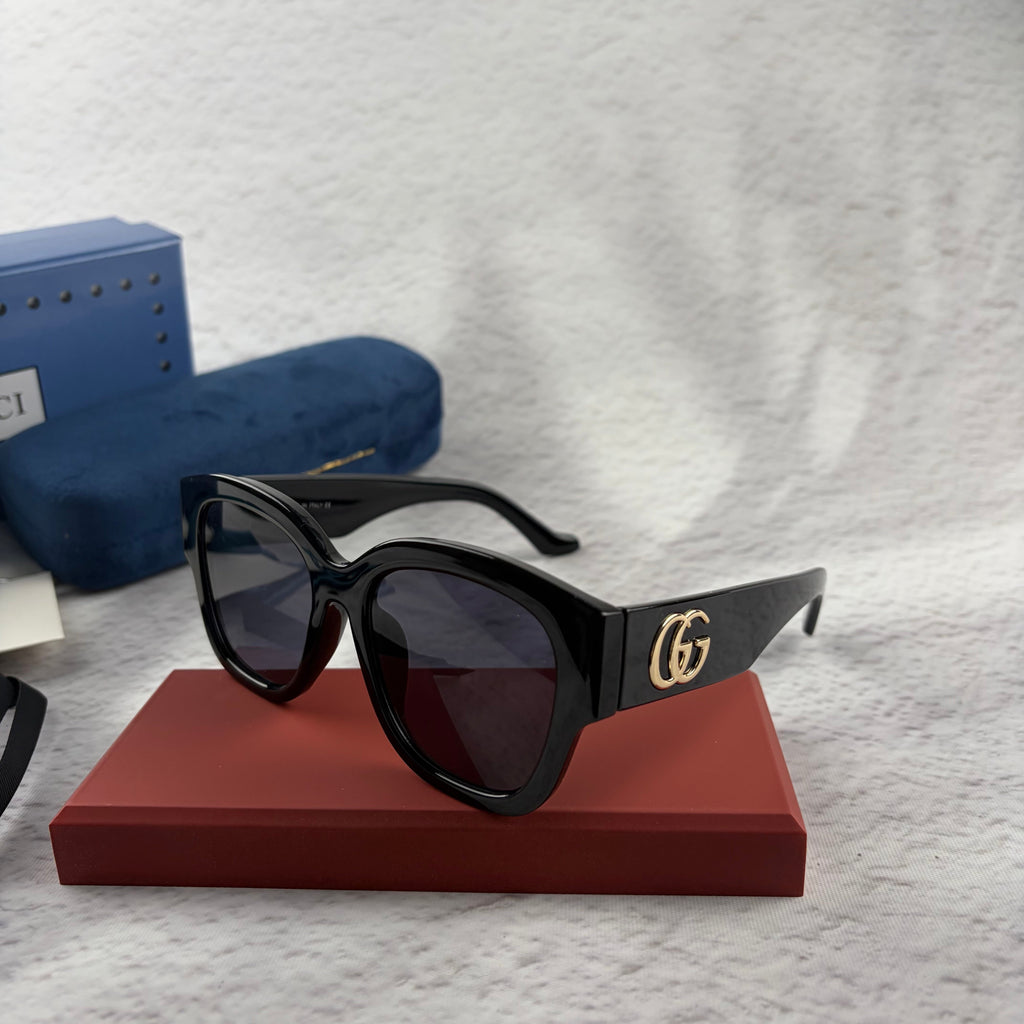 Classic Oversized Black Frame Sunglasses with Gold Accents