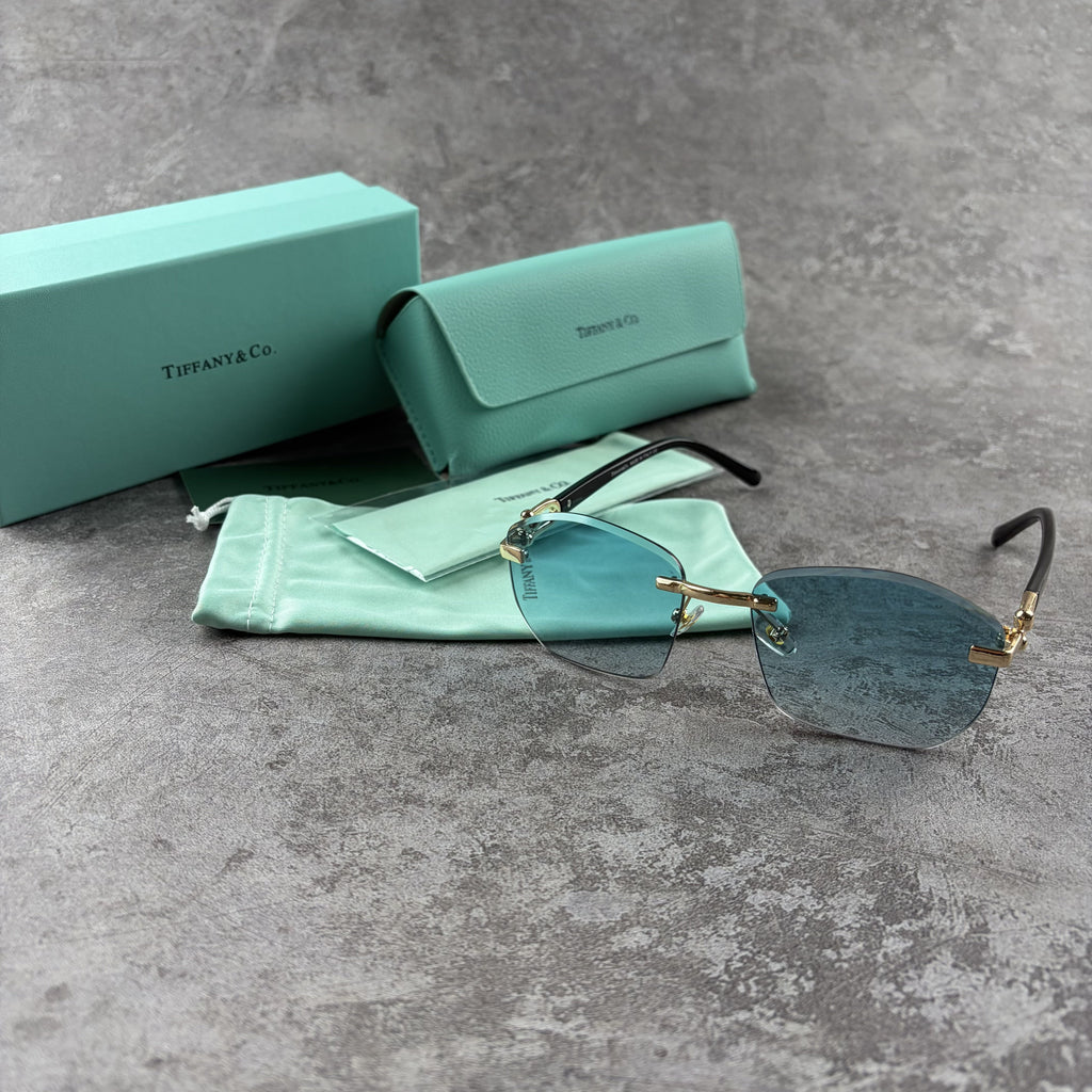 Elegant Rimless Blue Tint Sunglasses – Lightweight Gold Frame