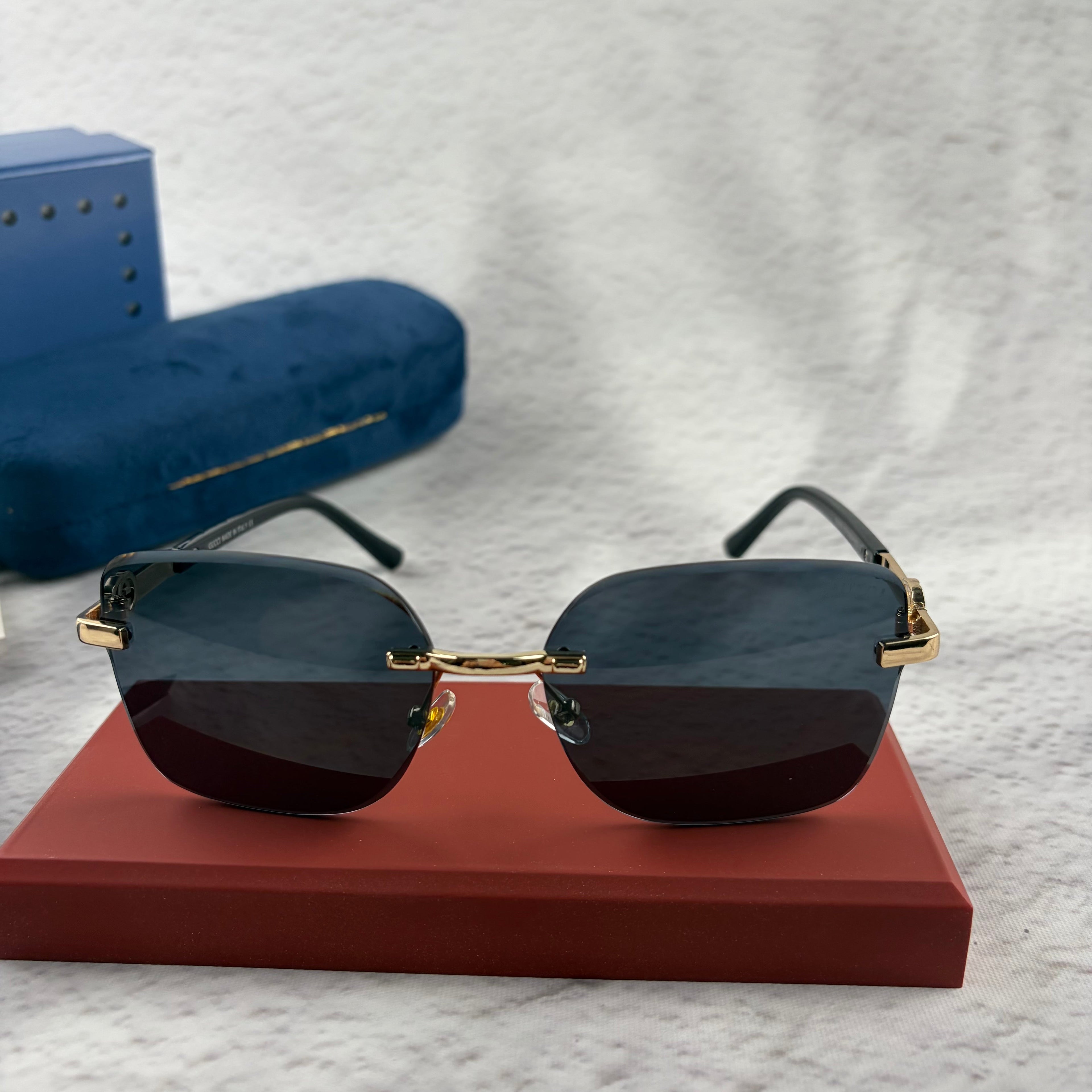 Rimless Rectangular Sunglasses with Gold-Tone Accents & UV Protection