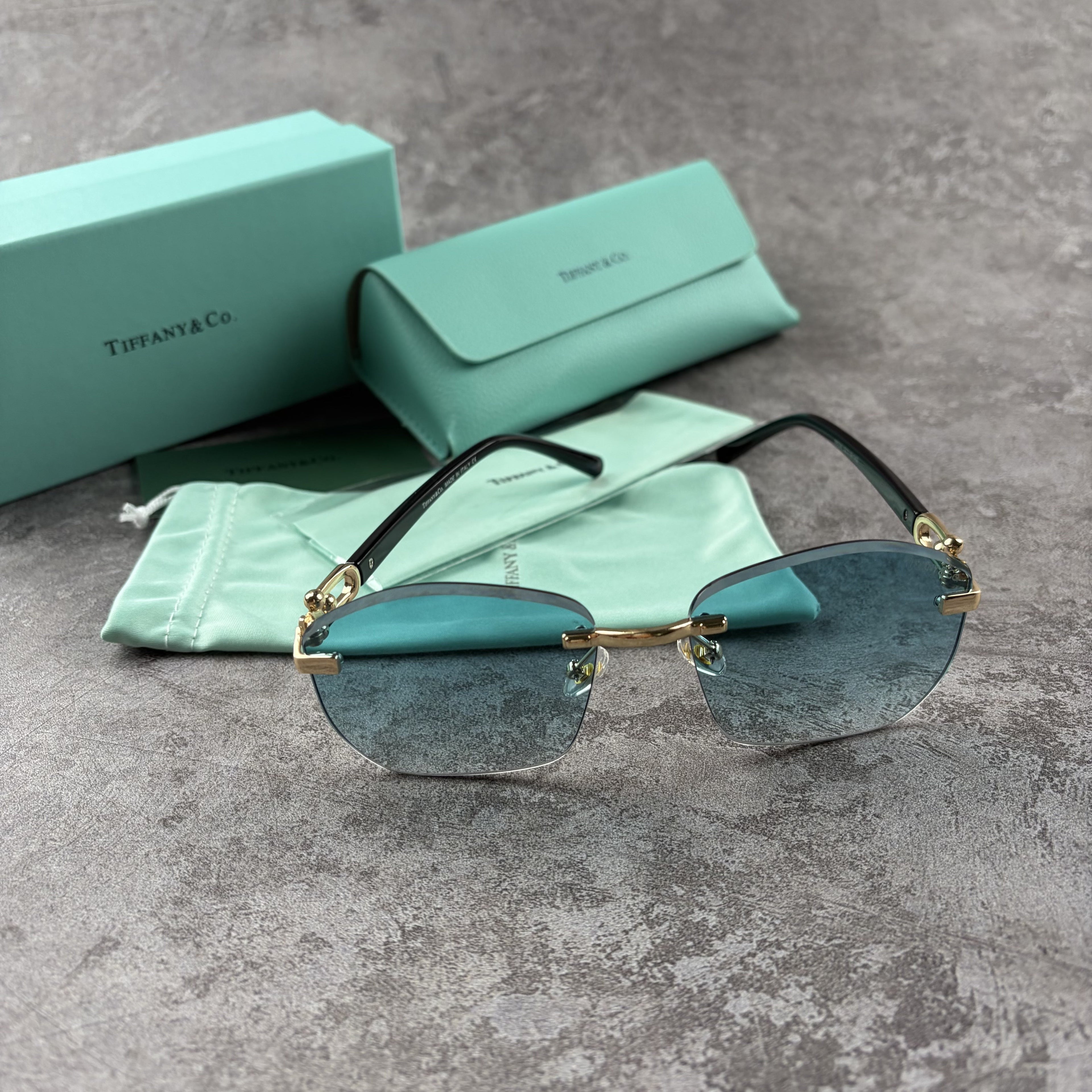 Elegant Rimless Blue Tint Sunglasses – Lightweight Gold Frame